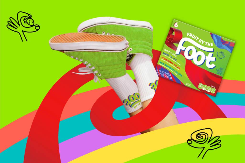 Green background with a pair of feet in the air with green shoes and white socks. A rainbow in the middle and a Fruit by the Foot variety pack including Berry Tie-Dye, Strawberry Tie-Die, and Blue Raspberry Tie-Dye flavors in the middle, surrounded by small illustrations.